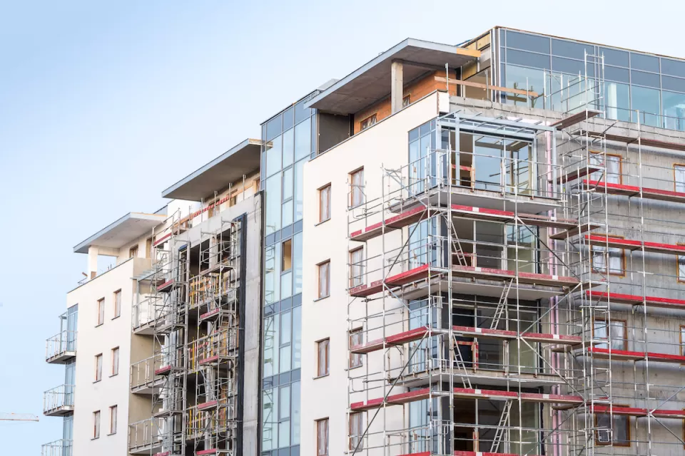 Multistory apartment building under construction.